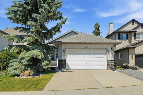 164 Sunterra Heights, Cochrane, AB - Outdoor With Facade