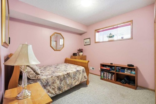 164 Sunterra Heights, Cochrane, AB - Indoor Photo Showing Bedroom