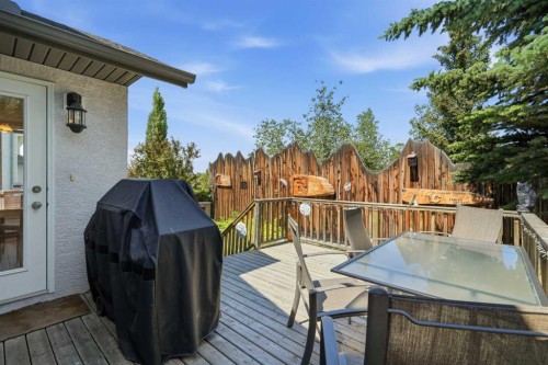 164 Sunterra Heights, Cochrane, AB - Outdoor With Deck Patio Veranda With Exterior