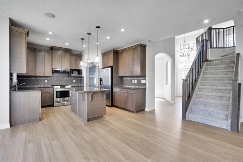 117 Hawkmere Place, Chestermere, AB - Indoor Photo Showing Kitchen With Upgraded Kitchen