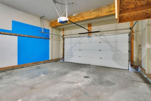 117 Hawkmere Place, Chestermere, AB - Indoor Photo Showing Garage