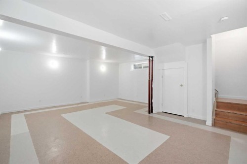66 Arbour Wood Mews Nw, Calgary, AB - Indoor Photo Showing Other Room
