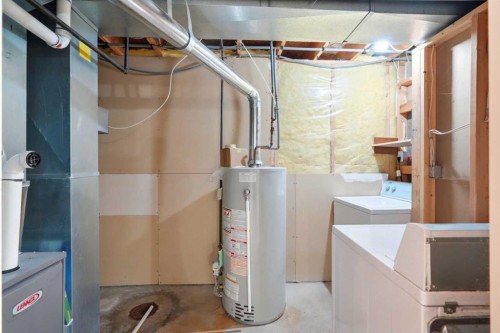 66 Arbour Wood Mews Nw, Calgary, AB - Indoor Photo Showing Basement