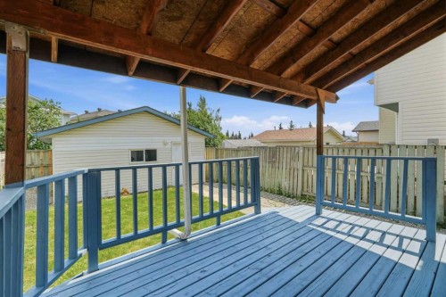 66 Arbour Wood Mews Nw, Calgary, AB - Outdoor With Deck Patio Veranda With Exterior