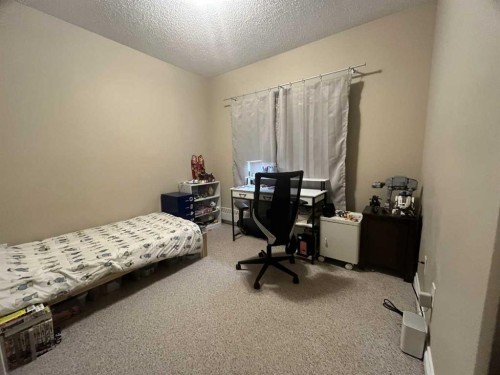305-30 Discovery Ridge Close Sw, Calgary, AB - Indoor Photo Showing Bedroom