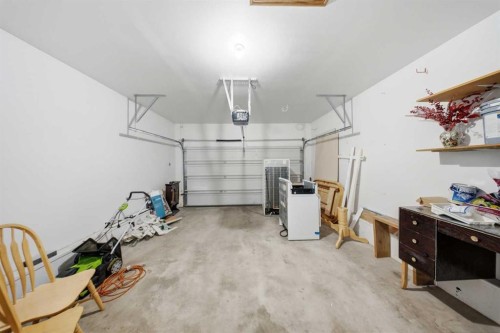 33 Martin Crossing Green Ne, Calgary, AB - Indoor Photo Showing Garage