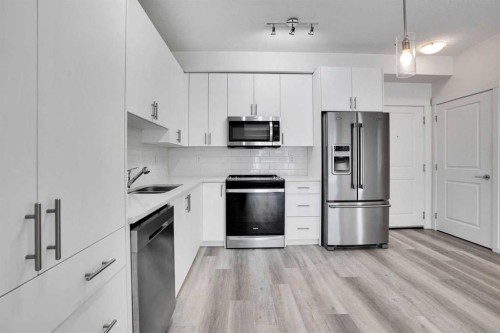 5216-15 Sage Meadows Landing Nw, Calgary, AB - Indoor Photo Showing Kitchen With Stainless Steel Kitchen With Double Sink