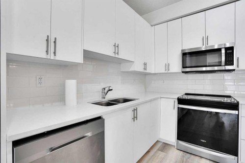 5216-15 Sage Meadows Landing Nw, Calgary, AB - Indoor Photo Showing Kitchen With Double Sink