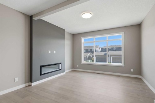231 Waterford Heights, Chestermere, AB - Indoor With Fireplace