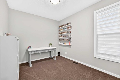 145 Kinniburgh Gardens, Chestermere, AB 