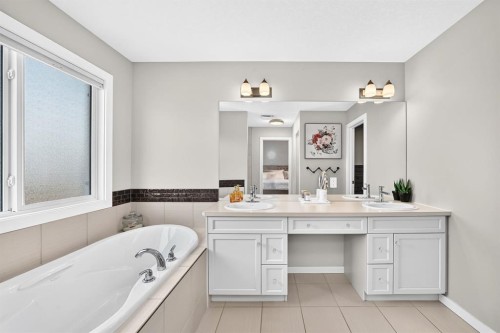 145 Kinniburgh Gardens, Chestermere, AB 