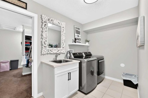 145 Kinniburgh Gardens, Chestermere, AB 