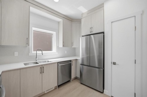 348 Cornerbrook Drive Ne, Calgary, AB - Indoor Photo Showing Kitchen With Stainless Steel Kitchen With Double Sink With Upgraded Kitchen