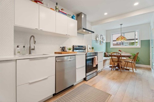 101-740 Bracewood Drive Sw, Calgary, AB - Indoor Photo Showing Kitchen With Stainless Steel Kitchen With Upgraded Kitchen
