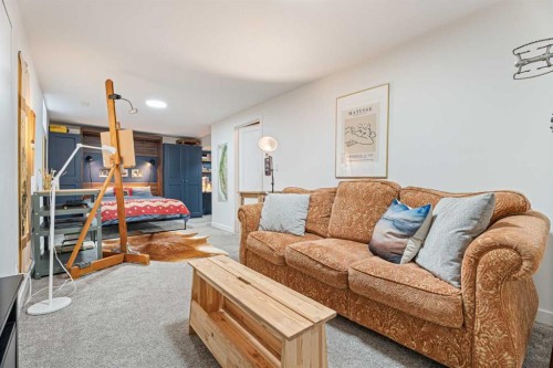 101-740 Bracewood Drive Sw, Calgary, AB - Indoor Photo Showing Living Room