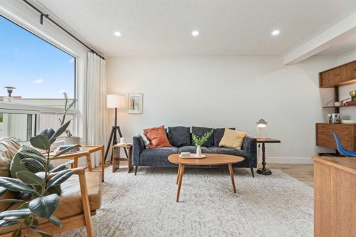 101-740 Bracewood Drive Sw, Calgary, AB - Indoor Photo Showing Living Room