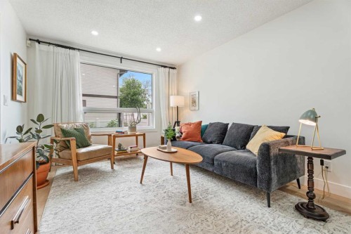 101-740 Bracewood Drive Sw, Calgary, AB - Indoor Photo Showing Living Room