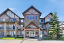2103-211 Aspen Stone Boulevard Sw, Calgary, AB  - Outdoor With Facade 