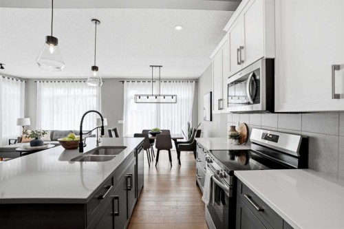 201 Marina Key, Chestermere, AB - Indoor Photo Showing Kitchen With Double Sink With Upgraded Kitchen
