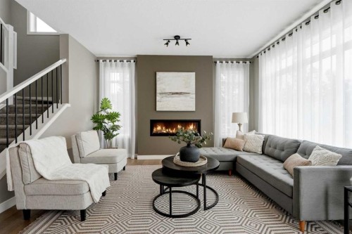 201 Marina Key, Chestermere, AB - Indoor Photo Showing Living Room With Fireplace