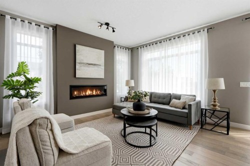 201 Marina Key, Chestermere, AB - Indoor Photo Showing Living Room With Fireplace