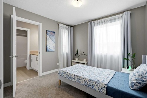 201 Marina Key, Chestermere, AB - Indoor Photo Showing Bedroom