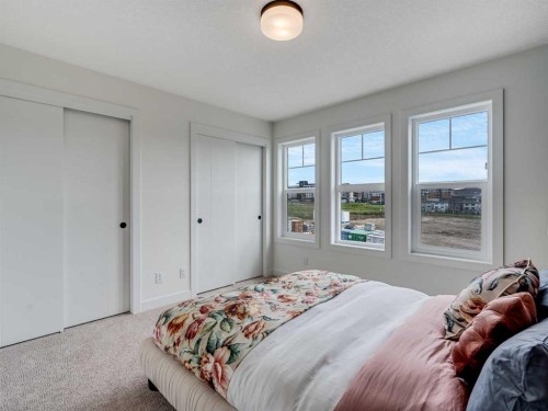 6106-200 Southridge Drive, Okotoks, AB - Indoor Photo Showing Bedroom