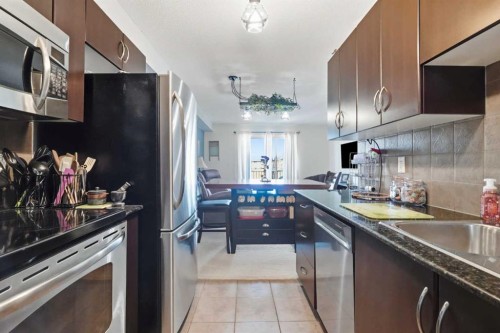 2409-60 Panatella Street, Calgary, AB - Indoor Photo Showing Kitchen With Stainless Steel Kitchen With Upgraded Kitchen