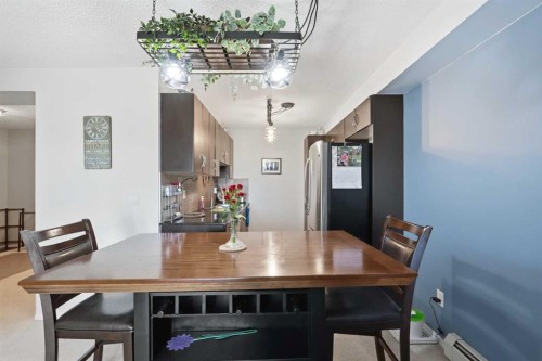 2409-60 Panatella Street, Calgary, AB - Indoor Photo Showing Dining Room