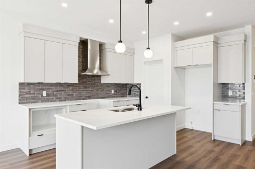 89 Heritage Park, Cochrane, AB - Indoor Photo Showing Kitchen With Upgraded Kitchen