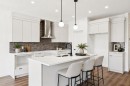 89 Heritage Park, Cochrane, AB  - Indoor Photo Showing Kitchen With Double Sink With Upgraded Kitchen 