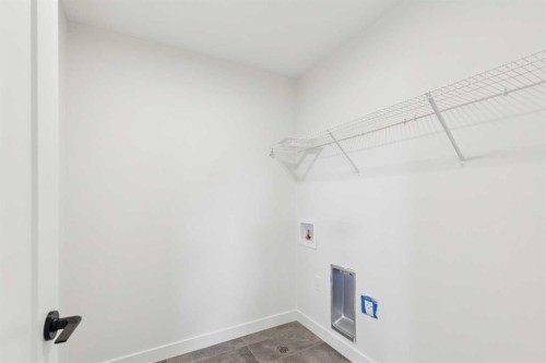 89 Heritage Park, Cochrane, AB - Indoor With Storage