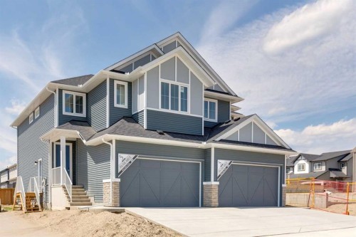 89 Heritage Park, Cochrane, AB - Outdoor With Facade