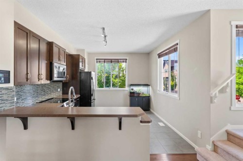 58 Evansview Road Nw, Calgary, AB - Indoor Photo Showing Kitchen With Double Sink