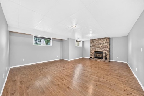142 Strathmore Lakes Place, Strathmore, AB - Indoor With Fireplace