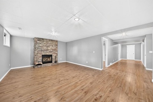 142 Strathmore Lakes Place, Strathmore, AB - Indoor With Fireplace