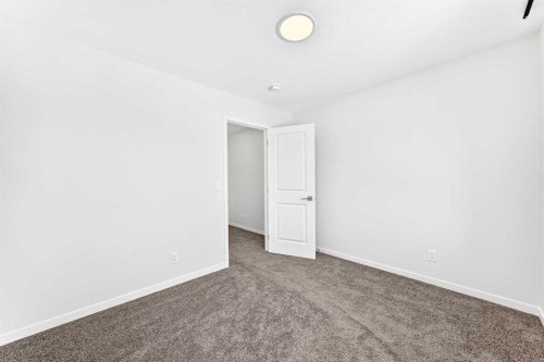 41 Corner Glen Row Ne, Calgary, AB - Indoor Photo Showing Other Room