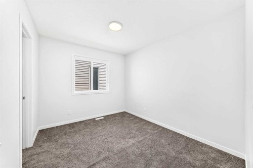 41 Corner Glen Row Ne, Calgary, AB - Indoor Photo Showing Other Room