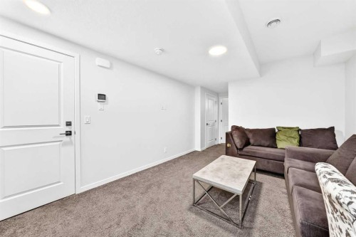 41 Corner Glen Row Ne, Calgary, AB - Indoor Photo Showing Living Room