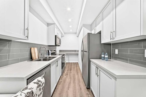 41 Corner Glen Row Ne, Calgary, AB - Indoor Photo Showing Kitchen With Double Sink