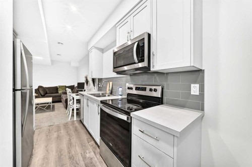41 Corner Glen Row Ne, Calgary, AB - Indoor Photo Showing Kitchen With Double Sink With Upgraded Kitchen