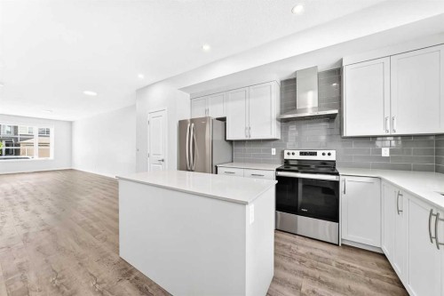 41 Corner Glen Row Ne, Calgary, AB - Indoor Photo Showing Kitchen With Upgraded Kitchen