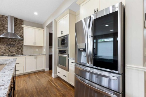 16 Auburn Sound Crescent Se, Calgary, AB - Indoor Photo Showing Kitchen With Upgraded Kitchen