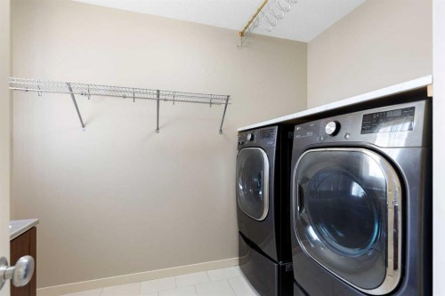 16 Auburn Sound Crescent Se, Calgary, AB - Indoor Photo Showing Laundry Room