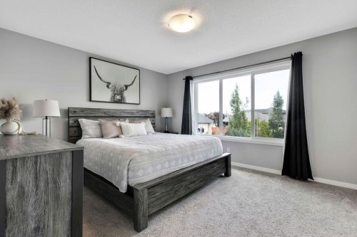 1714 Montgomery Gate Se, High River, AB - Indoor Photo Showing Bedroom