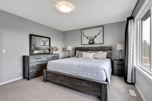 1714 Montgomery Gate Se, High River, AB - Indoor Photo Showing Bedroom