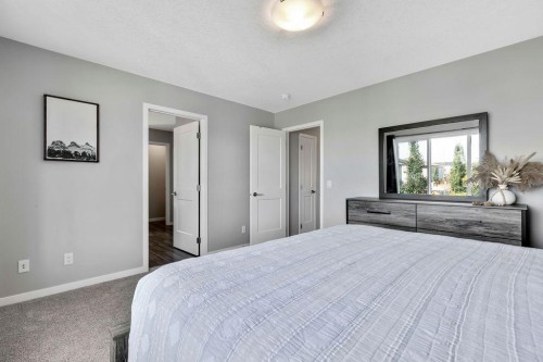 1714 Montgomery Gate Se, High River, AB - Indoor Photo Showing Bedroom
