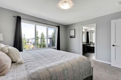 1714 Montgomery Gate Se, High River, AB - Indoor Photo Showing Bedroom