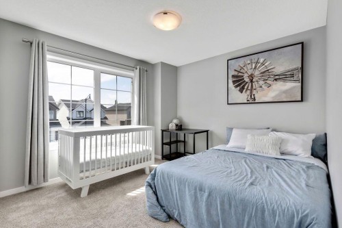 1714 Montgomery Gate Se, High River, AB - Indoor Photo Showing Bedroom