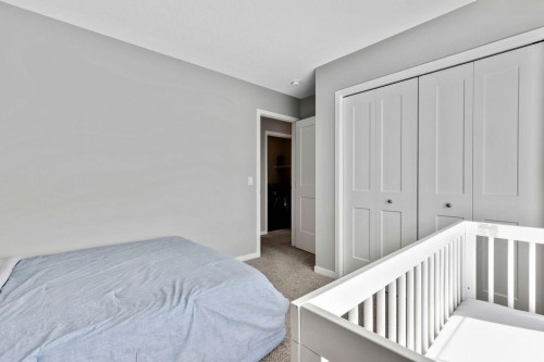 1714 Montgomery Gate Se, High River, AB - Indoor Photo Showing Bedroom